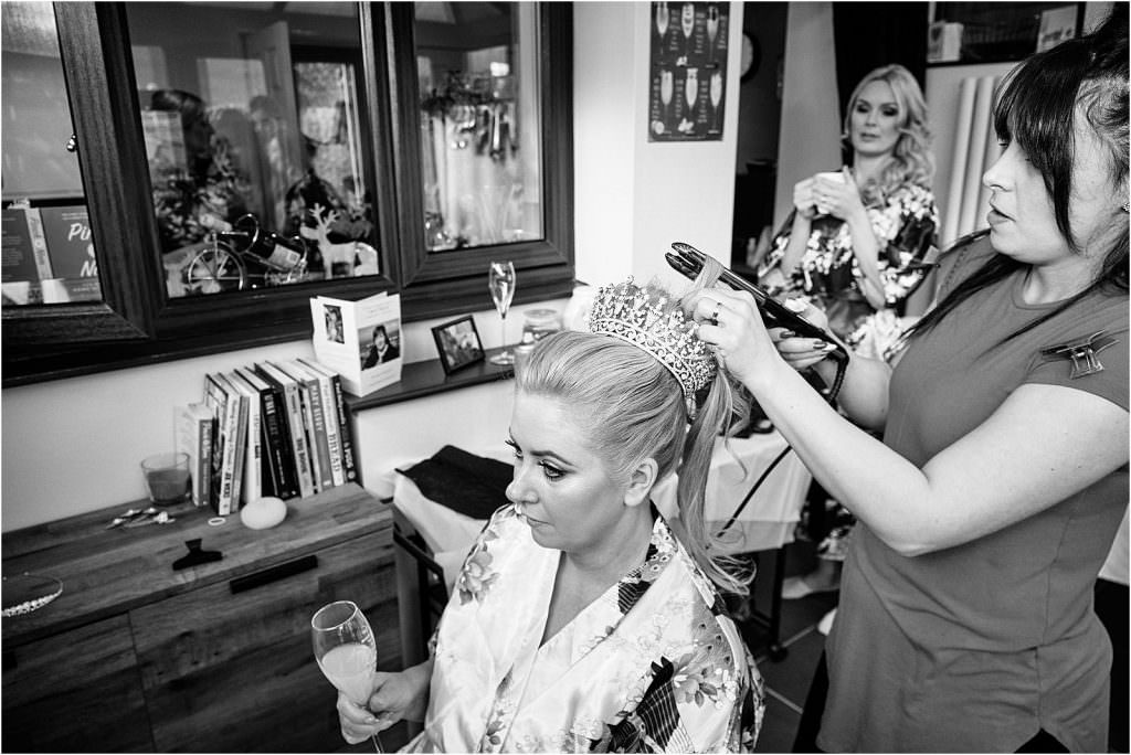 Creative candid photos of the wedding morning for the bridal party ahead of the wedding at St Michaels Church in Penkridge by Documentary Wedding Photographer Stuart James