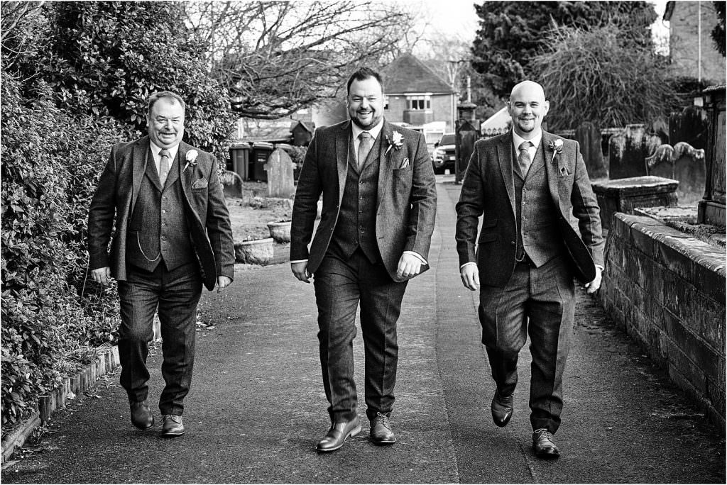 Capturing the arrival of the groomsmen at St Michaels Church in Penkridge by Documentary Wedding Photographer Stuart James