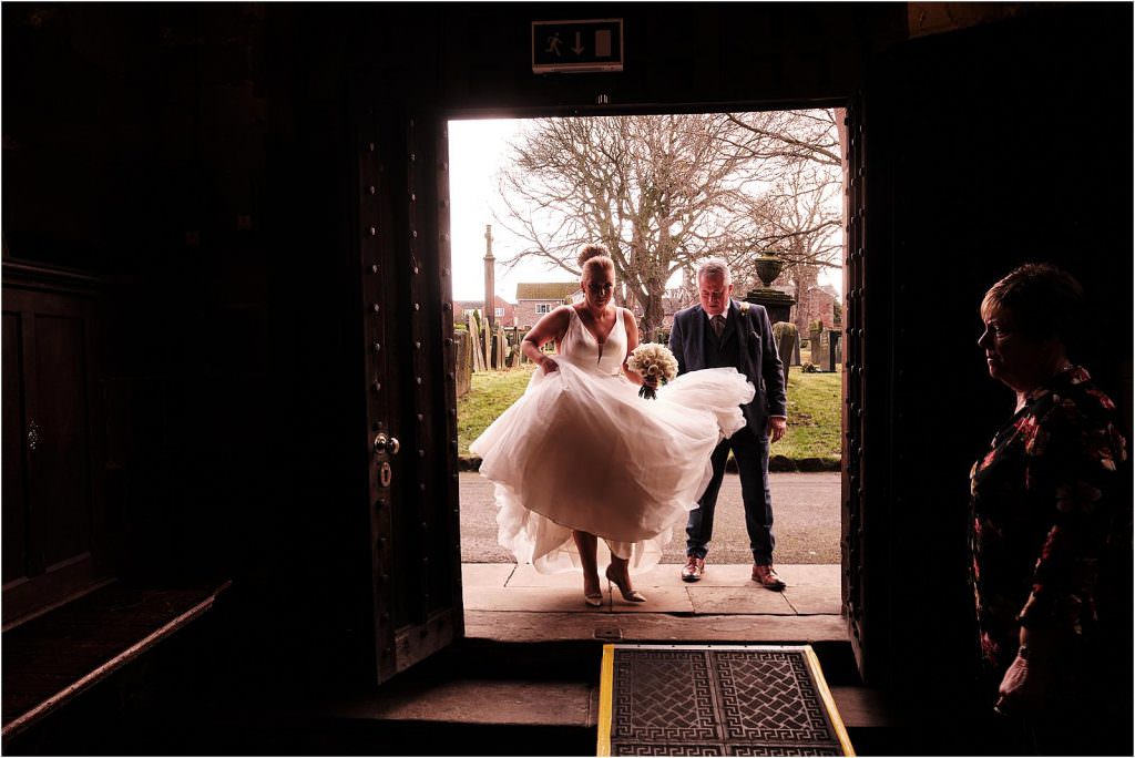The final moments before the wedding ceremony, captured at St Michaels Church in Penkridge by Cannock Wedding Photographer Stuart James