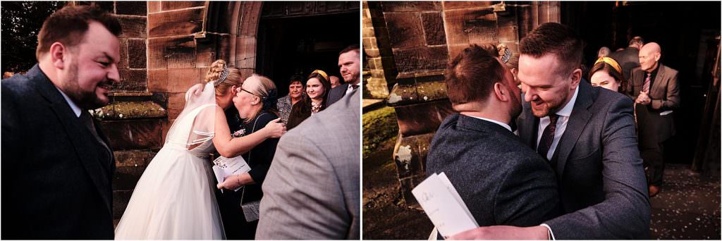 Documenting the guests congratulating the newlyweds at St Michaels Church in Penkridge by Cannock Wedding Photographer Stuart James