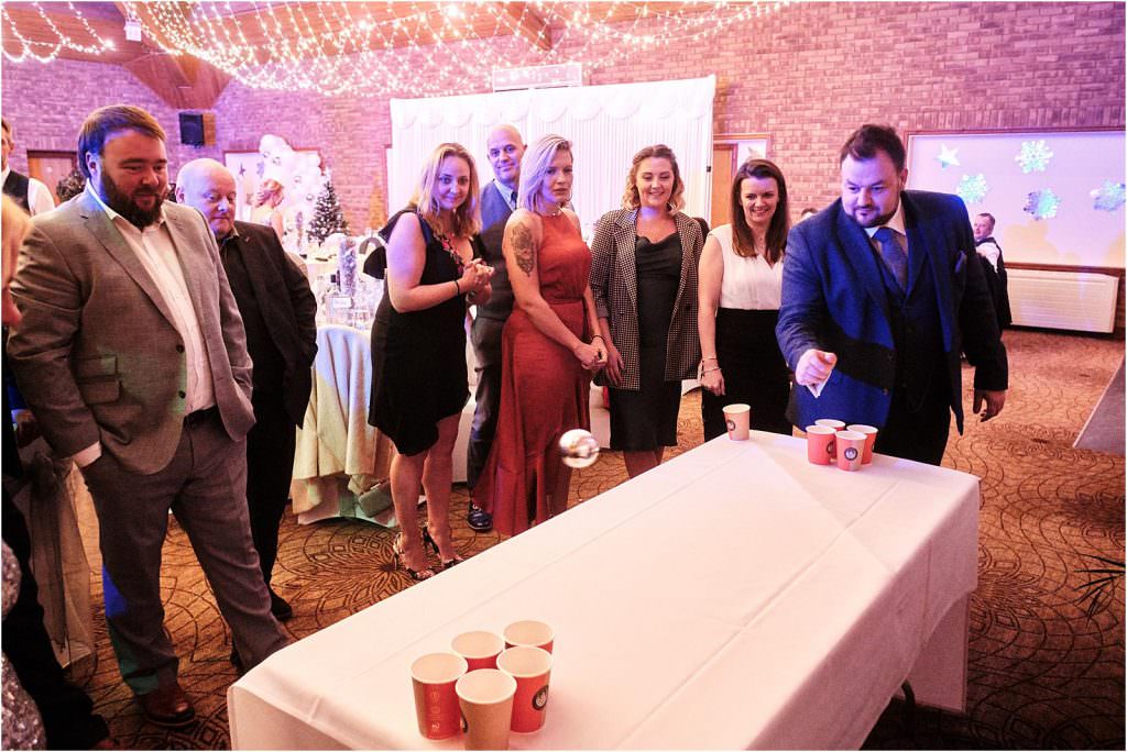 Creative candid photos capture the fun of the wedding as everyone relaxes and enjoys the reception at The Chase in Cannock by Cannock Wedding Photographer Stuart James