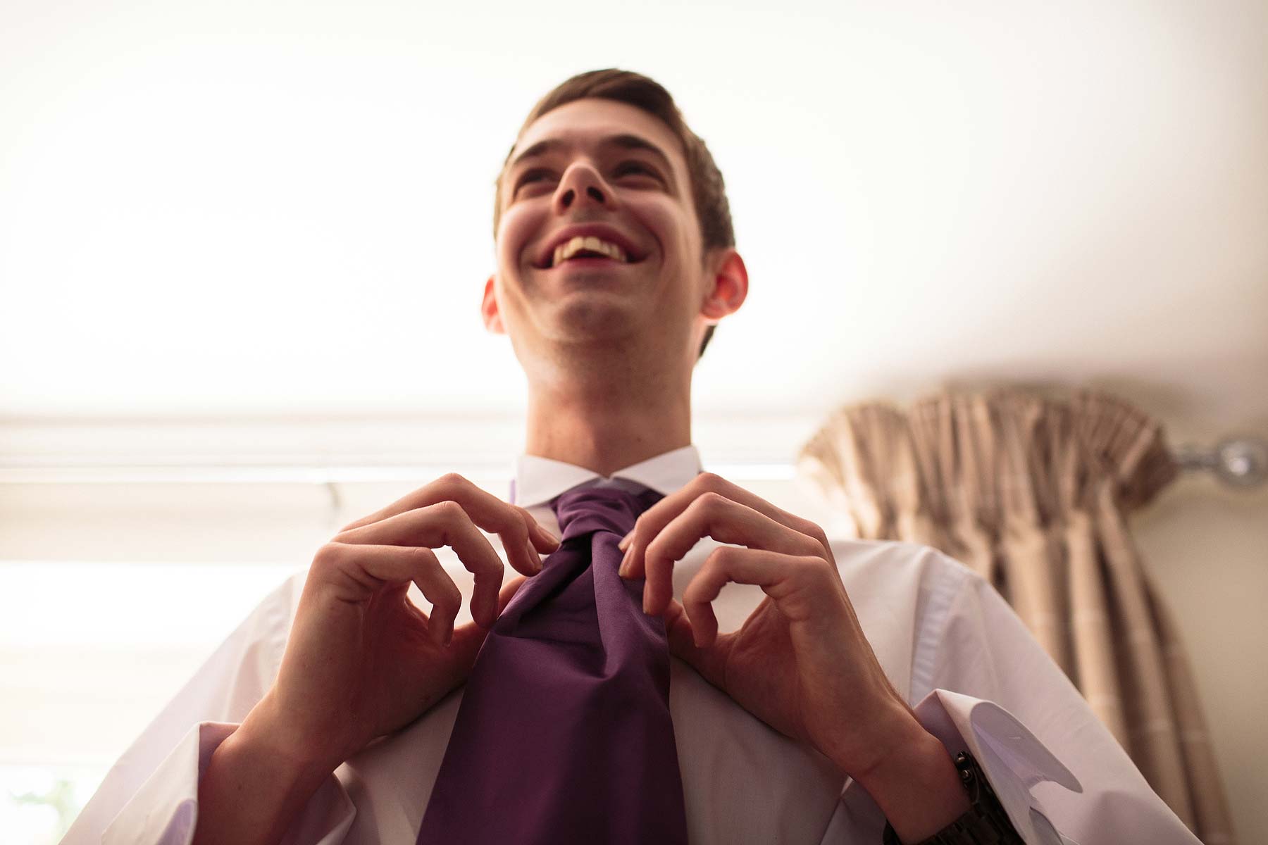 Documentary photography of the grooms morning preparations, telling the other side of the wedding story at The Ashes in Endon by Leek Documentary Wedding Photographer Stuart James