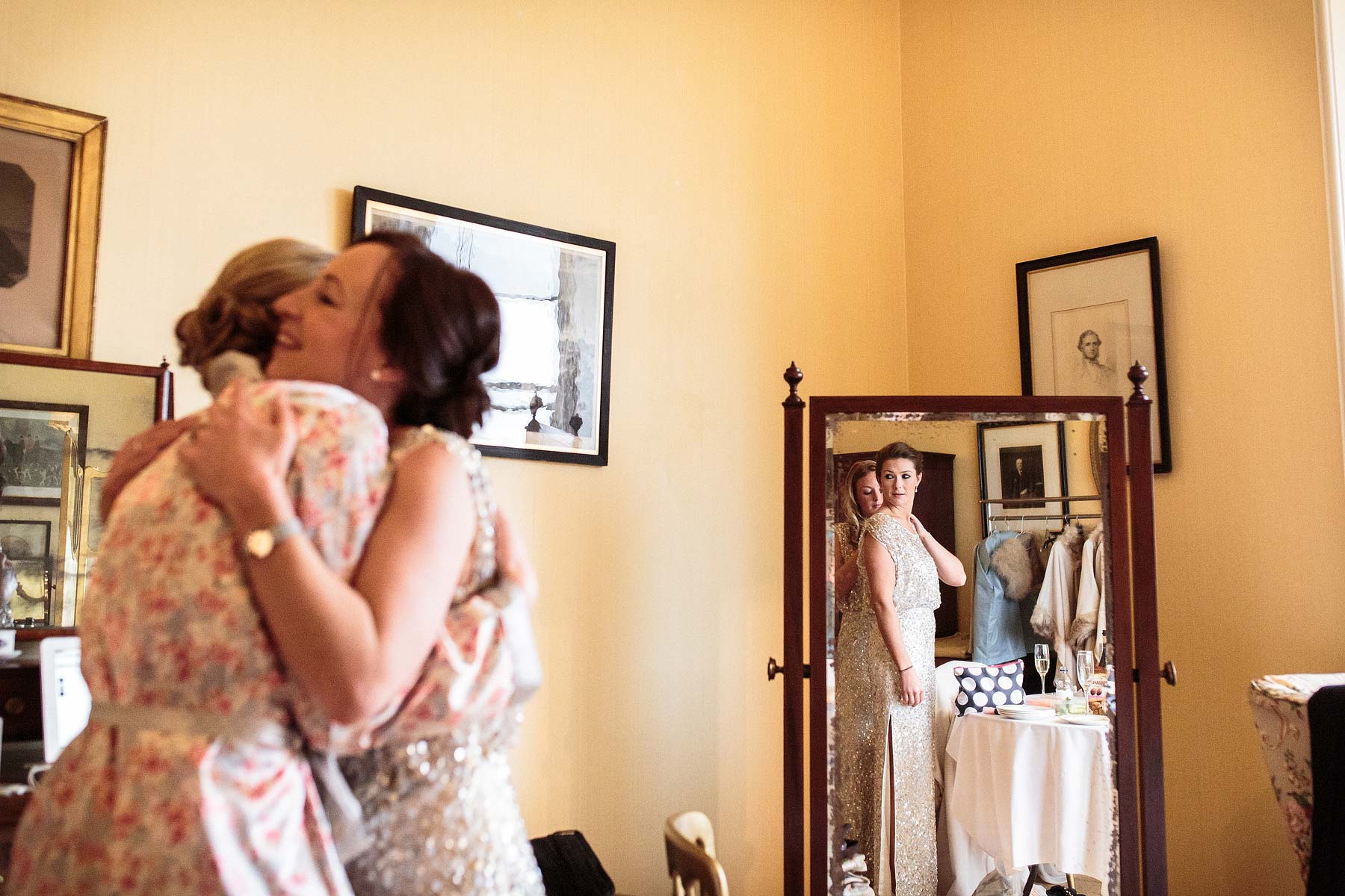 Reportage photographs of the emotional final preparations before the wedding at Sandon Hall in Stafford by Stafford Award Winning Wedding Photographer Stuart James