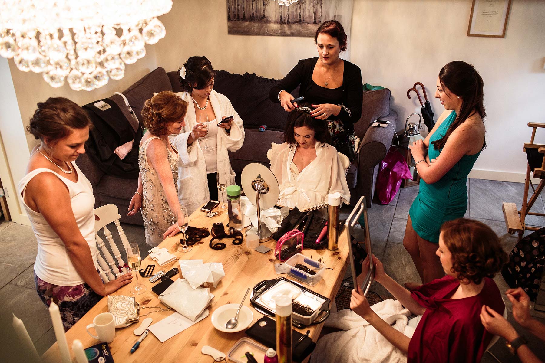 Candid photos capture the emotion during the present giving on the wedding morning at The Ashes in Endon by Leek Documentary Wedding Photographer Stuart James