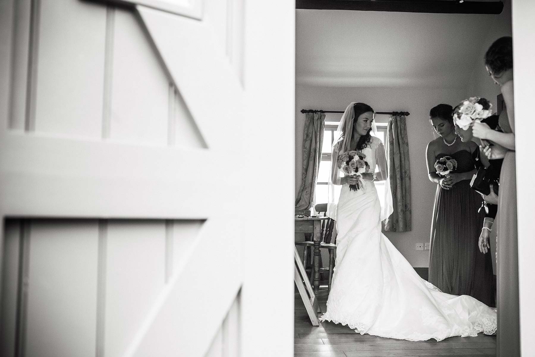 Reportage photos that capture the excitement as the bride gets ready for her wedding at The Ashes in Endon by Leek Documentary Wedding Photographer Stuart James
