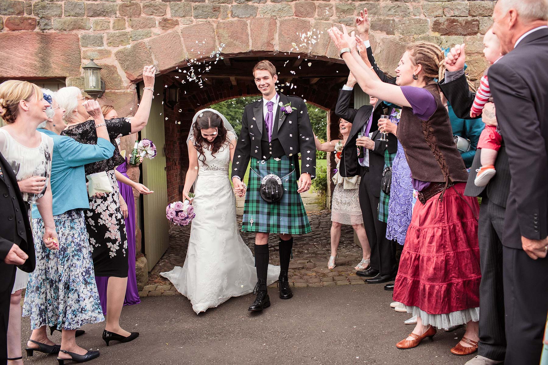 Confetti fun at The Ashes in Endon by Leek Documentary Wedding Photographer Stuart James