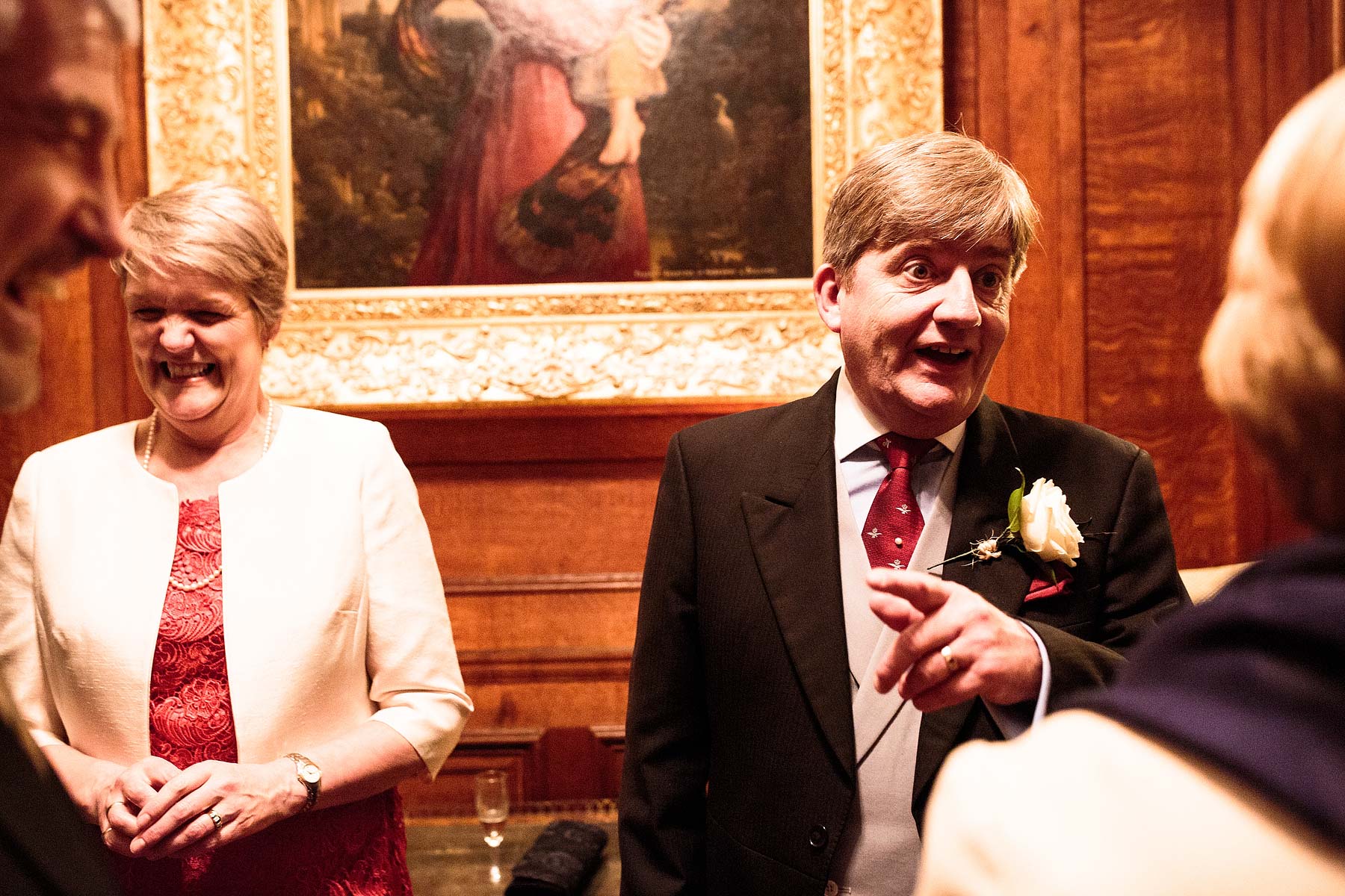 Candid photographs of the guests show the fun and interaction as the guests enjoy the drinks reception at Sandon Hall in Stafford by Stafford Conemporary Wedding Photographer Stuart James