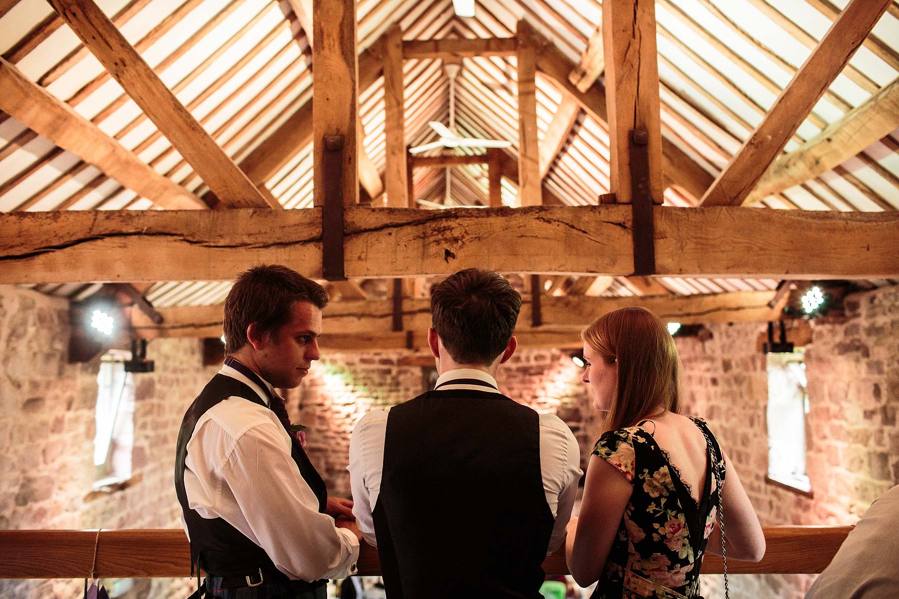 Candid photos of the guests relaxing and enjoying the wedding reception at The Ashes in Endon by Leek Documentary Wedding Photographer Stuart James