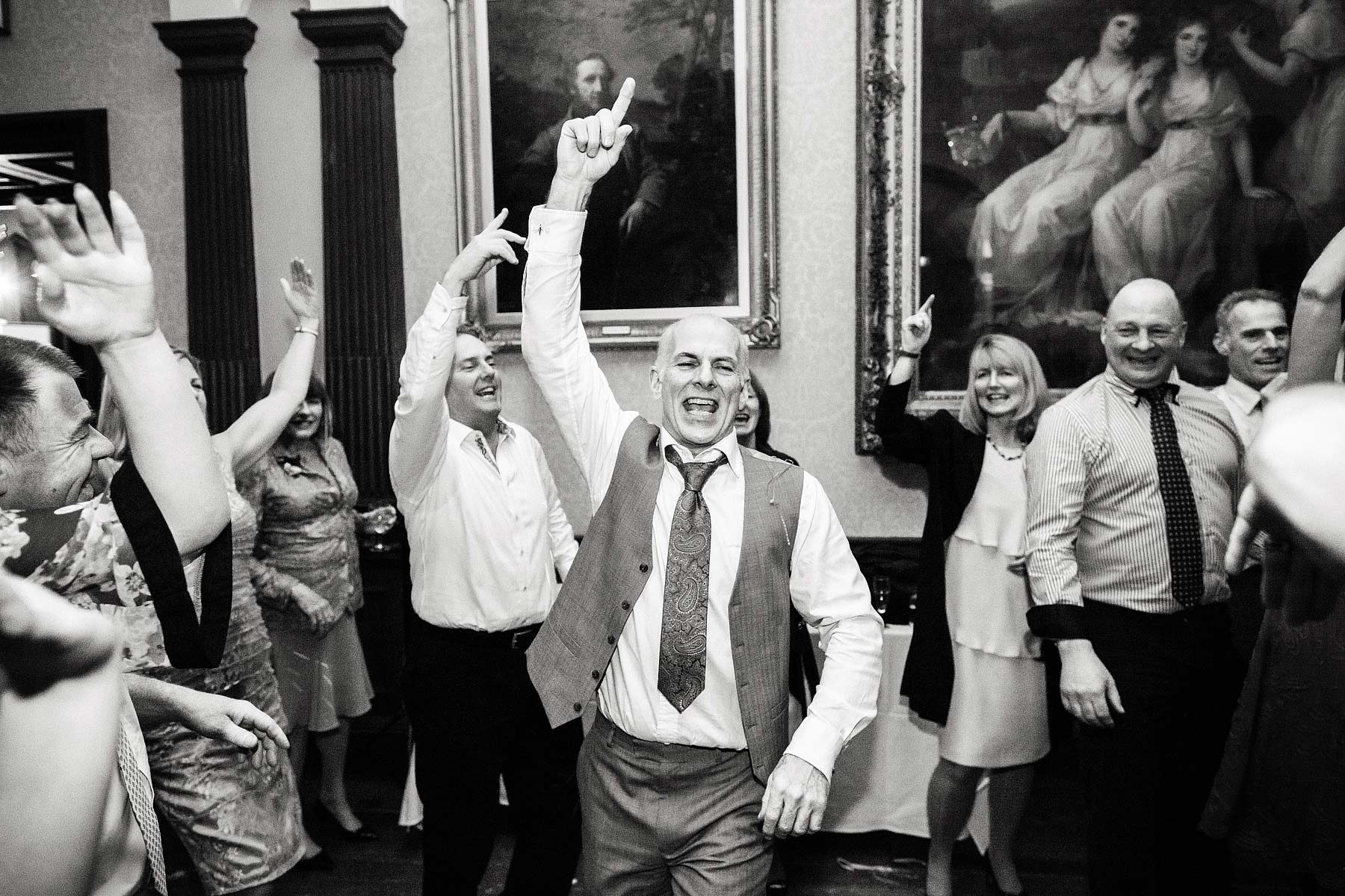 Capturing the fun and excitement of the wedding party at Sandon Hall in Stafford by Documentary Wedding Photographer Stuart James