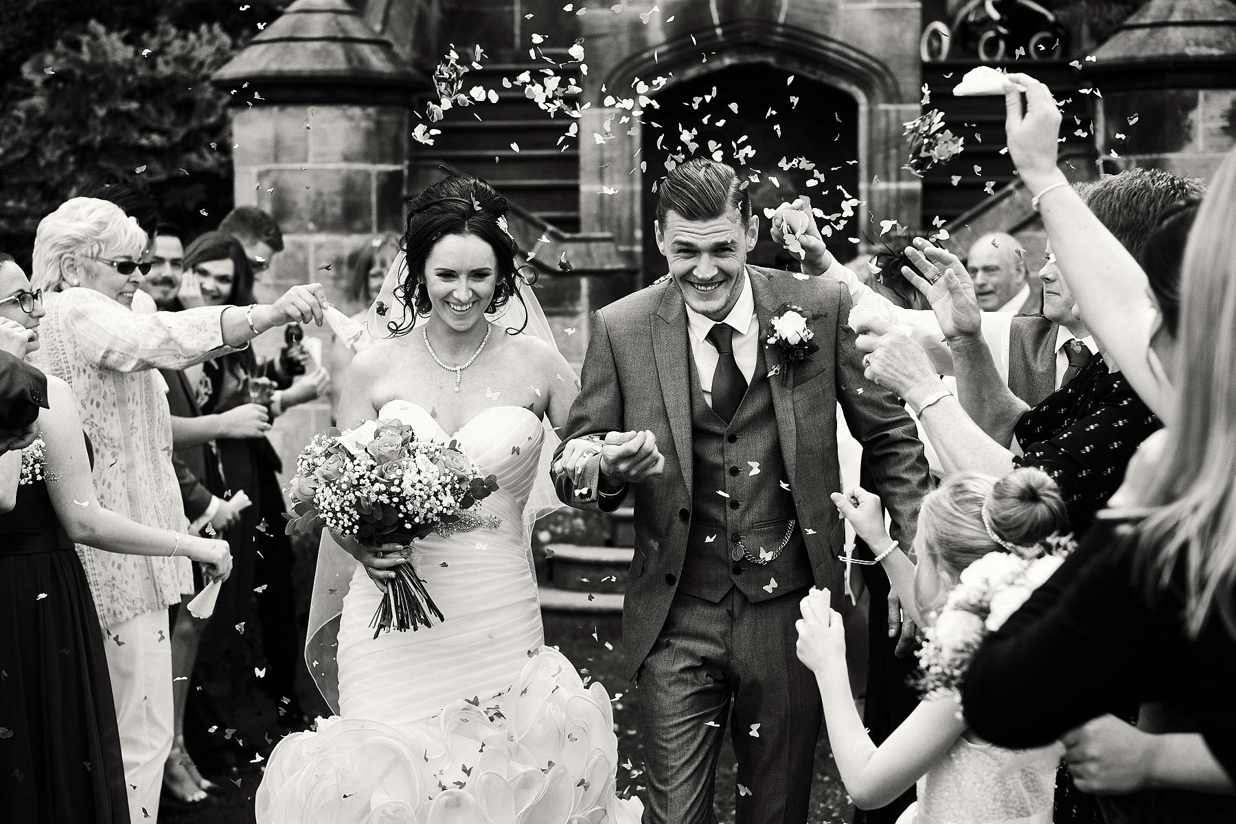 Confetti fun at Allerton Castle in Yorkshire by Documentary Wedding Photographer Stuart James