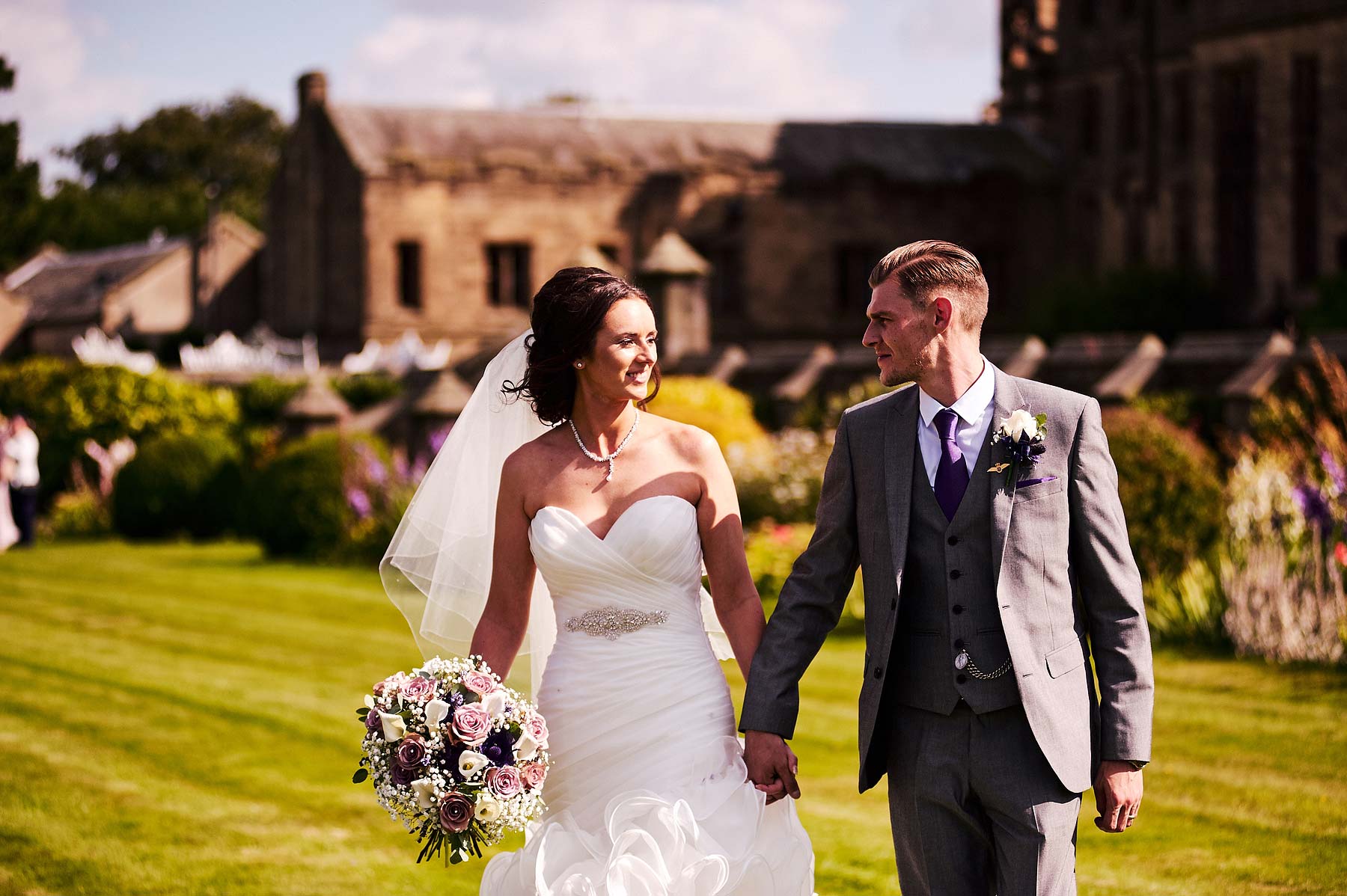Natural portraits of the beautiful bride and groom around the grounds of Allerton Castle in Yorkshire by Documentary Wedding Photographer Stuart James