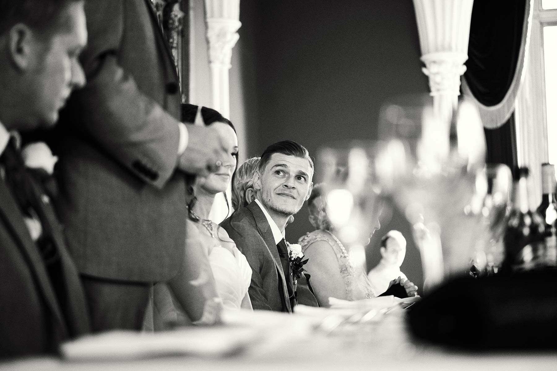 Capturing the reactions to the entertaining and emotional speeches at Allerton Castle in Yorkshire by Documentary Wedding Photographer Stuart James