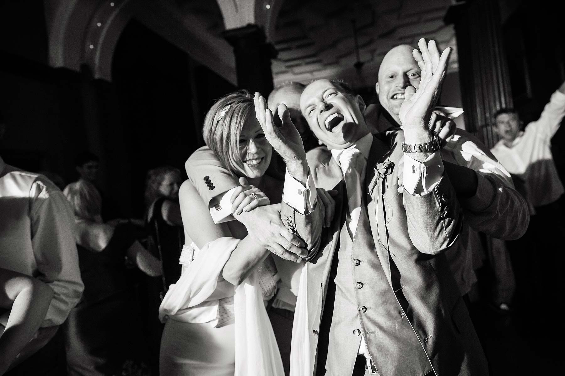 Photographs of brilliant party at Sandon Hall in Staffordshire by Documentary Wedding Photographer Stuart James