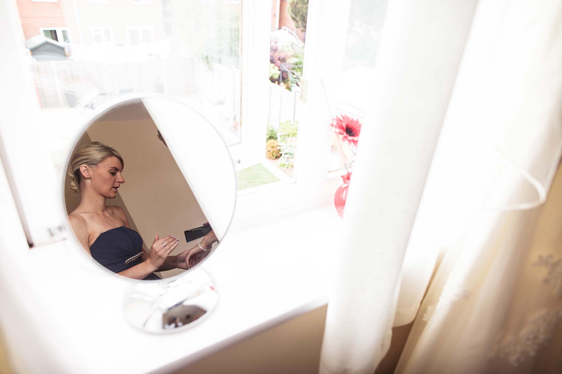 Candid photos at home of makeup and morning preparations wedding at Somerford Hall in Brewood by Staffordshire Wedding Photographer Stuart James