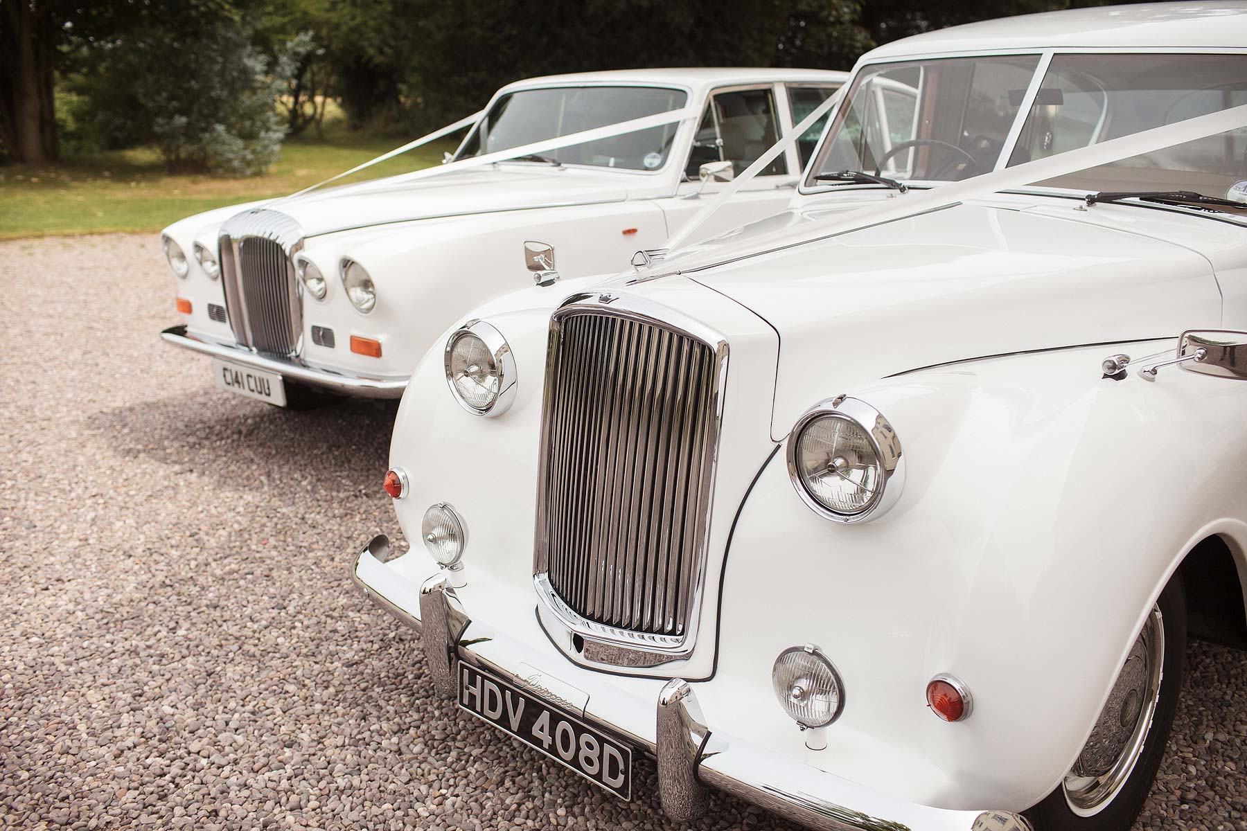 Wedding cars for wedding at Somerford Hall in Brewood by Documentary Wedding Photographer Stuart James