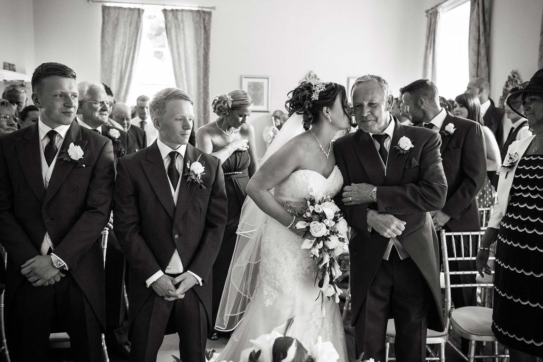 Wedding photographs that tell the story of the emotion and excitement of the wedding ceremony at Somerford Hall in Brewood by Reportage Wedding Photographer Stuart James