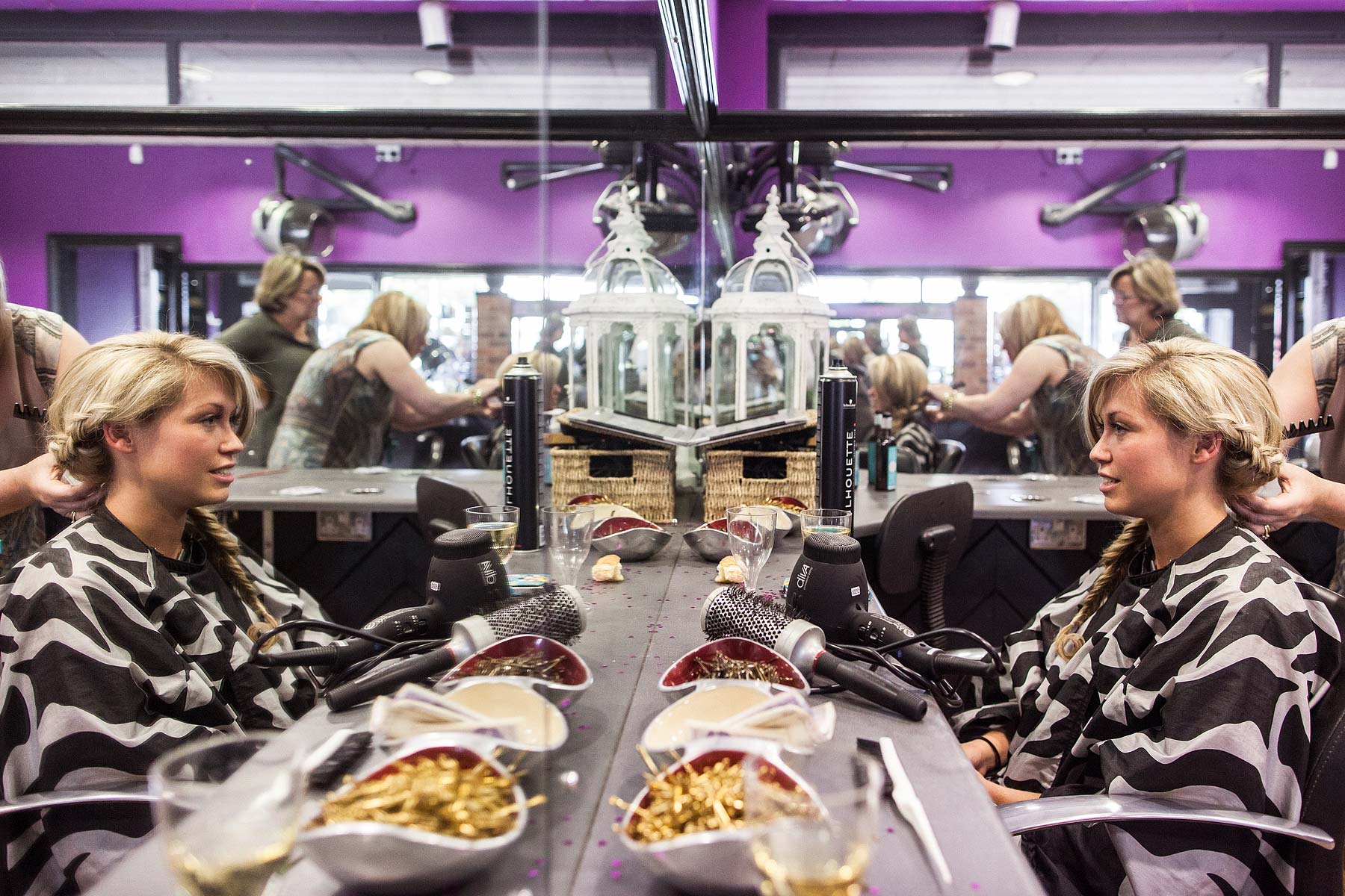 Unobtrusive reportage photos of hair and makeup preparations on wedding morning at Weston Park in Staffordshire by Documentary Wedding Photographer Stuart James