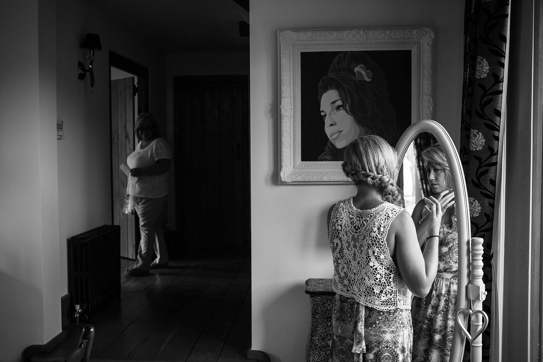 Unobtrusive reportage photos of hair and makeup preparations on wedding morning at Weston Park in Staffordshire by Documentary Wedding Photographer Stuart James