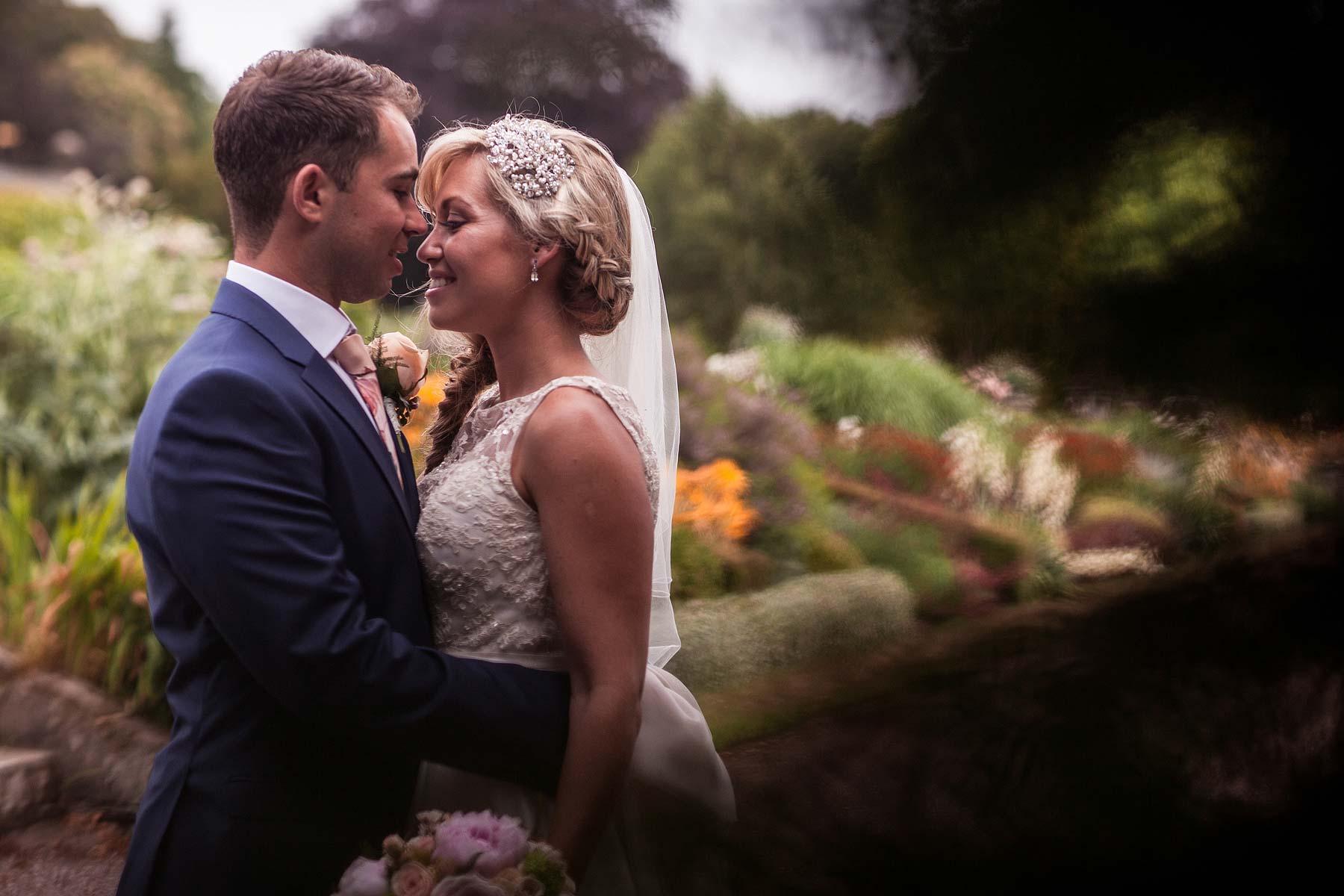 Intimate relaxed portraits of Bride and Groom at Weston Park in Staffordshire by Documentary Wedding Photographer Stuart James