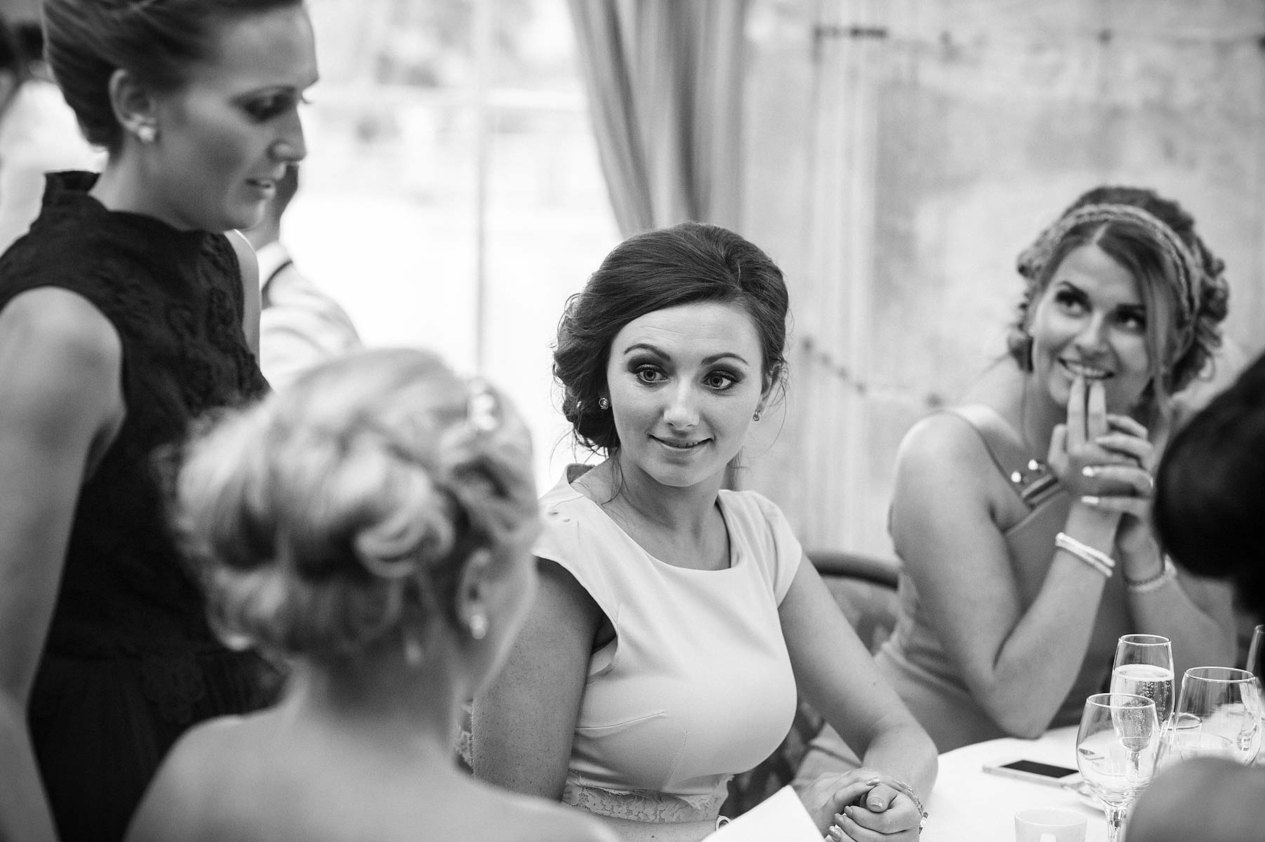 Reportage photographs of guests enjoying meal at Weston Park in Staffordshire by Stafford Wedding Photographer Stuart James