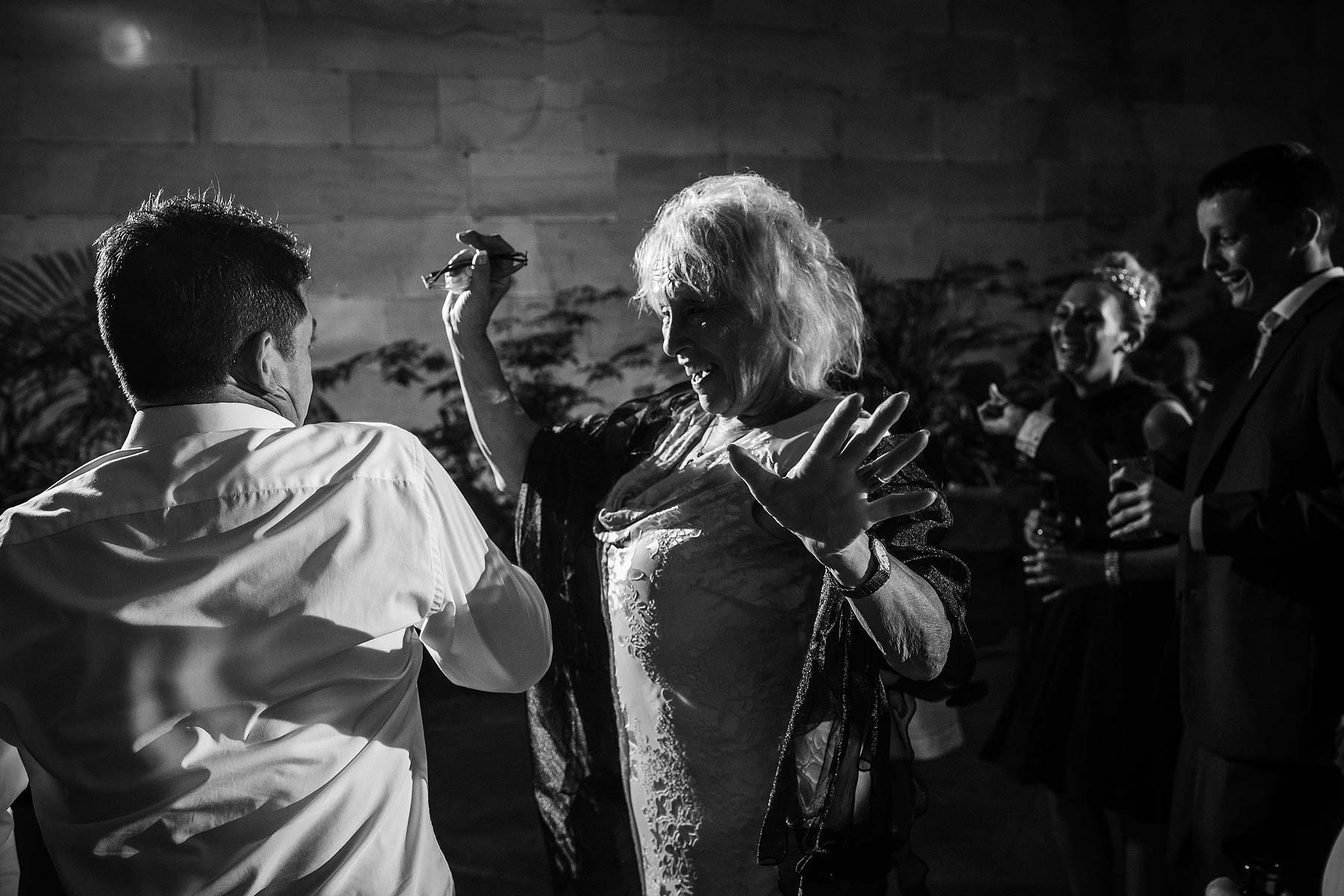 Relaxed natural photographs of evenings dancing and partying at Weston Park in Weston-under-Lizard by Documentary Wedding Photographer Stuart James