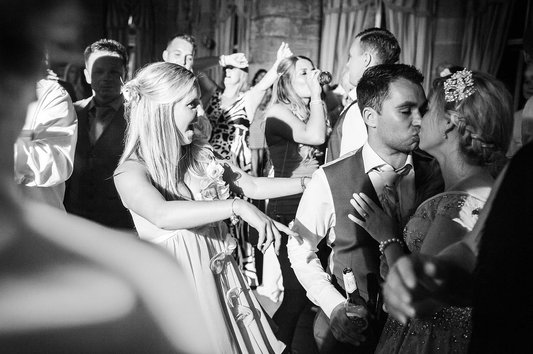 Relaxed natural photographs of evenings dancing and partying at Weston Park in Weston-under-Lizard by Documentary Wedding Photographer Stuart James
