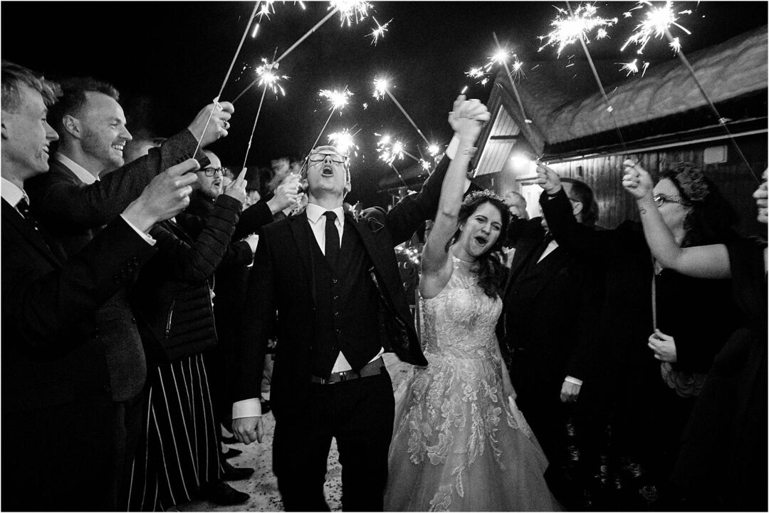 Celebrating the fun at the end of the wedding at Oslo in Norway by Documentary Wedding Photographer Stuart James