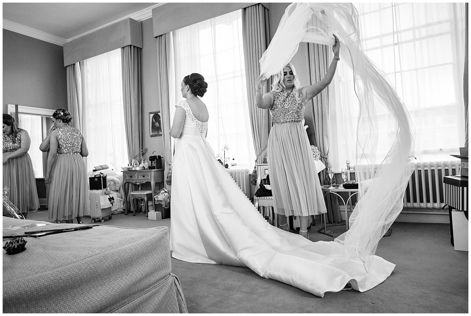 Photographs showing the beautiful moment our bride dresses in her dress from Muse Bridal at Hawkstone Hall in Shrewsbury by Documentary Wedding Photographer Stuart James