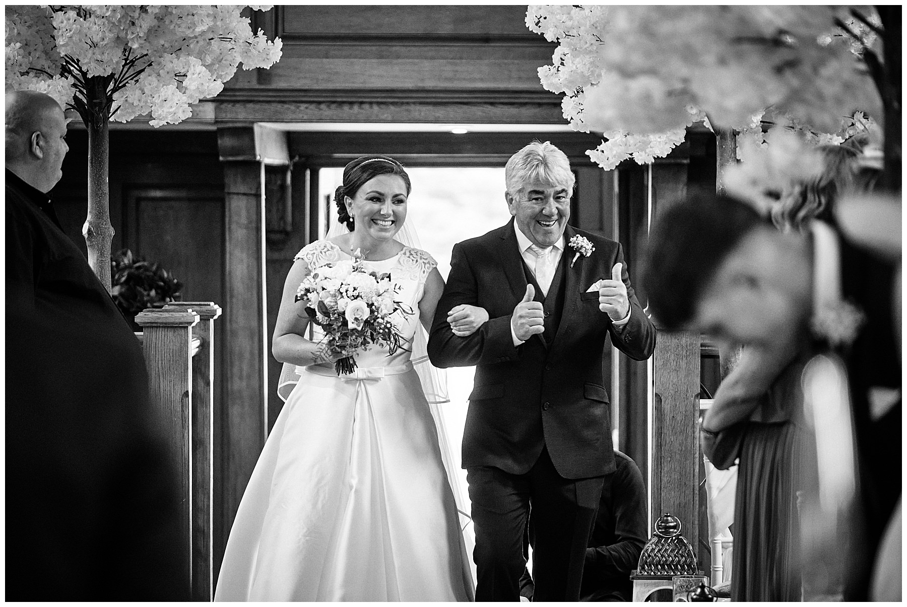 Photographs that capture the story and emotion as the bridal party make their entrance to the wedding ceremony in the Chapel at Hawkstone Hall in Shrewsbury by Documentary Wedding Photographer Stuart James