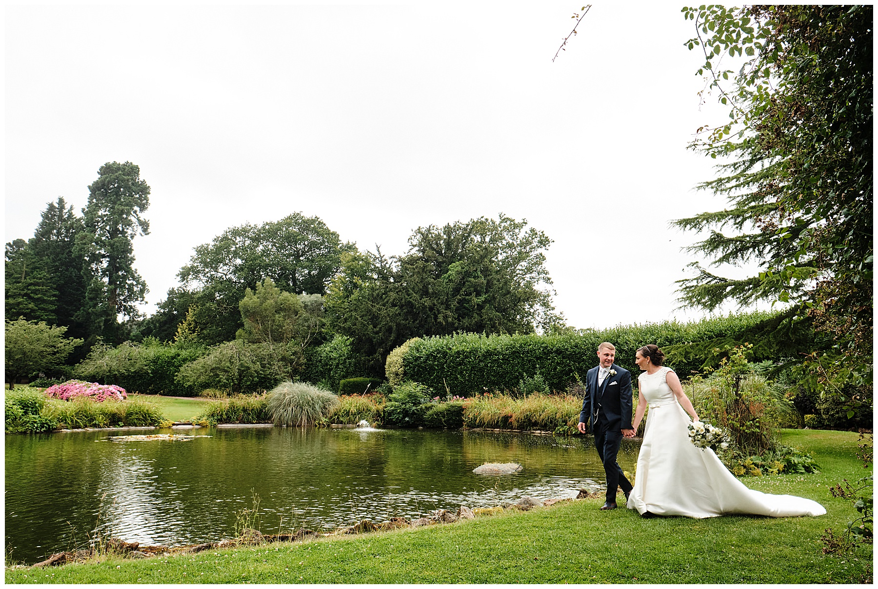 Natural portraits of the bride and groom around the beautiful gardens at Hawkstone Hall in Shrewsbury by Documentary Wedding Photographer Stuart James