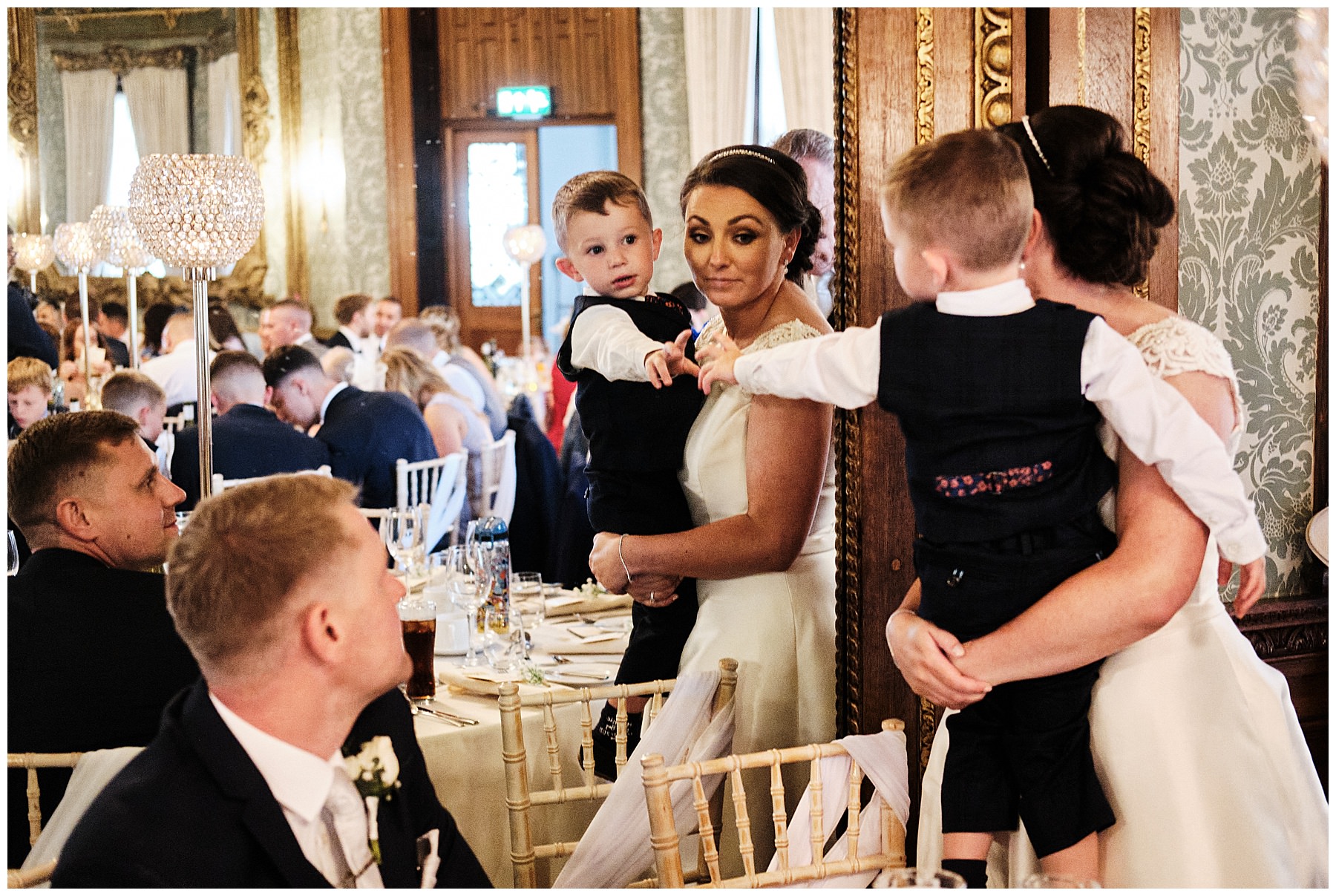 Natural candid photos capturing the guests relaxing and having fun during the wedding breakfast at Hawkstone Hall in Shrewsbury by Documentary Wedding Photographer Stuart James